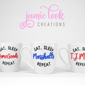 May include: Three white ceramic mugs with black text that reads "Eat, Sleep, [Store Name] Repeat". The store names are HomeGoods, Marshalls, and T.J. Maxx. The text is in red, blue, and red respectively.