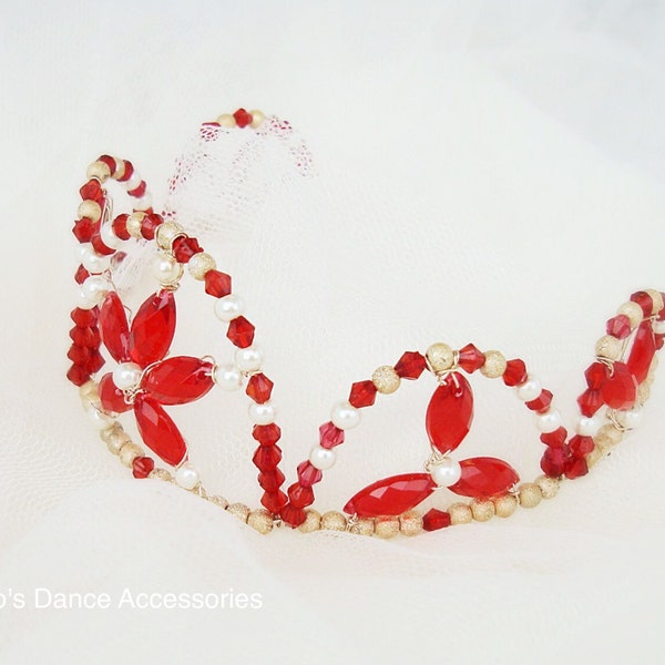 Red and gold ballet tiara. Compact, but stands out.  Ruby
