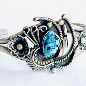 Vintage Fred G Artisan Navajo Cuff Bracelet of Sterling Silver with Center Natural Turquoise Gemstone Surrounded by Extensive Silver Detail