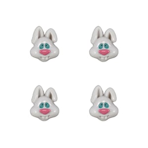 Peut inclure: Quatre boutons en céramique blanche en forme de lapin avec des yeux bleus et un nez rose. Les boutons mesurent environ 2,5 cm de diamètre.