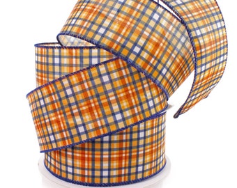 Peut inclure: Un rouleau de ruban à carreaux orange, bleu et blanc avec un bord cousu bleu.