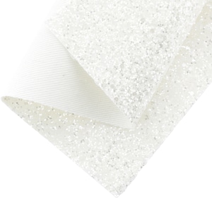 May include: White glitter fabric with a subtle shimmer. The fabric is folded in half, showing the white backing.