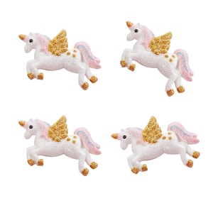 May include: Four white glitter unicorn figurines with gold wings and pink and blue manes. The unicorns are in a flying pose with their hooves raised.