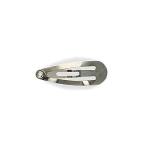 May include: A silver metal hair clip with a small clear rhinestone on the end.