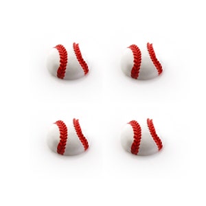 May include: Four white baseballs with red stitching. The baseballs are arranged in a square pattern.