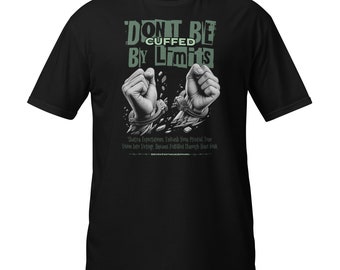 May include: Black t-shirt with a graphic of two hands breaking free from chains. The text "Don't Be Cuffed By Limits" is printed in green on the shirt.