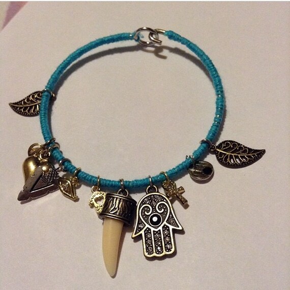 Items similar to Charm bangles on Etsy