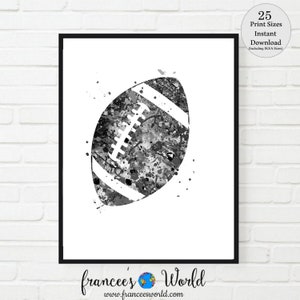 May include: Black and white watercolor painting of an American football. The football is surrounded by splatters of paint.