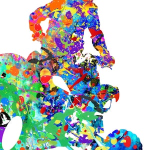 May include: A colorful abstract silhouette of a person riding an ATV. The image is made up of splashes of paint in various colors, including red, blue, green, yellow, and purple.