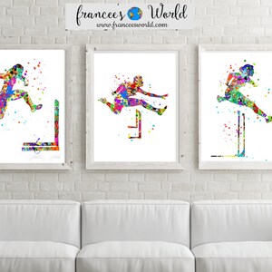 May include: Three watercolor paintings of athletes jumping over hurdles. The paintings are in a colorful, abstract style. The athletes are silhouetted in black and the hurdles are in various colors.