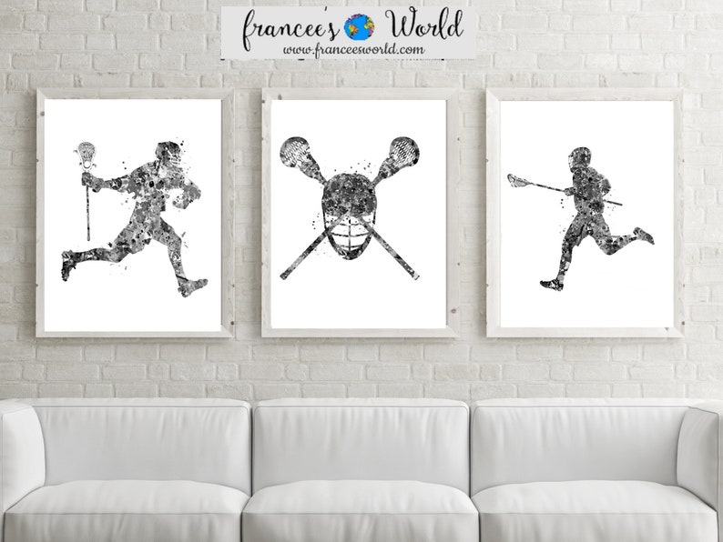 May include: Three black and white watercolor illustrations of lacrosse players. The first image shows a player running with a lacrosse stick. The second image shows two lacrosse sticks crossed over a lacrosse helmet. The third image shows a player running with a lacrosse stick.