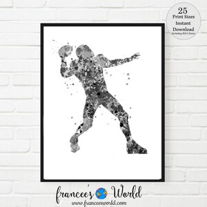 May include: Black and white watercolor painting of an American football player throwing a football. The player is in a dynamic pose, with the football in mid-air. The painting has a splattered effect, giving it a unique and artistic look.