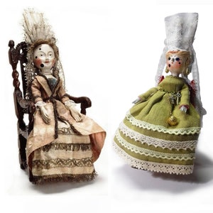 Wooden, doll on pegs. Interpretation. William Higgs.