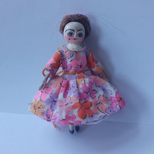 Wooden doll Pandora. Queen Anne .two and a half inches.