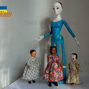 Santos doll, angel. Wooden, polychrome sculpture.