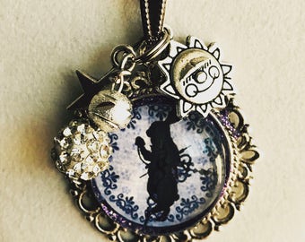 Chain with a pendant of Alice in Wonderland