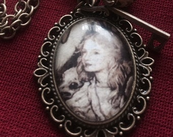 Bronze pendant with "Alice in Wonderland" picture