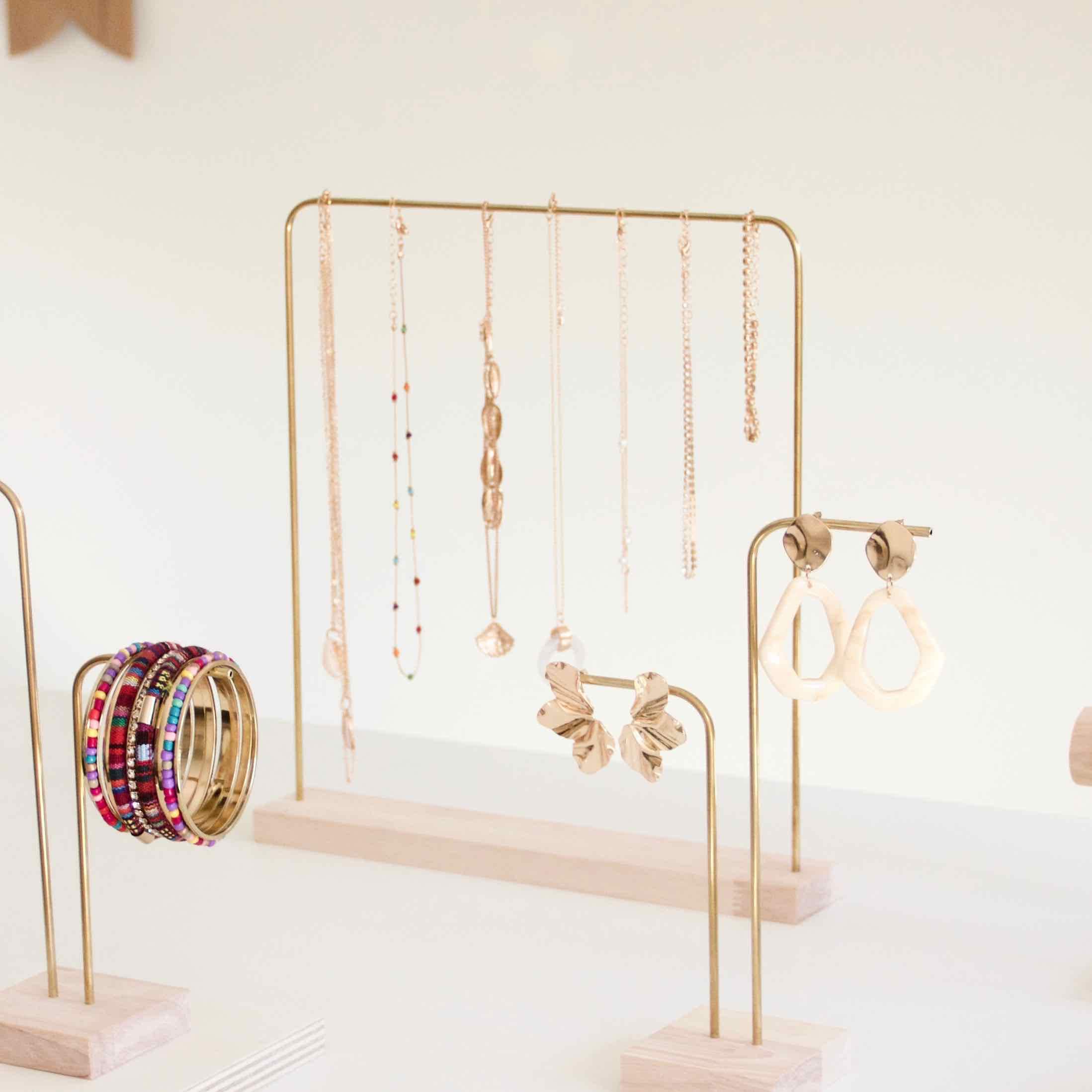Gold necklace holder deals