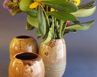 A set of 3 Ceramic vases. Handmade, wheel thrown ceramic vases. Medium size ceramic vases.