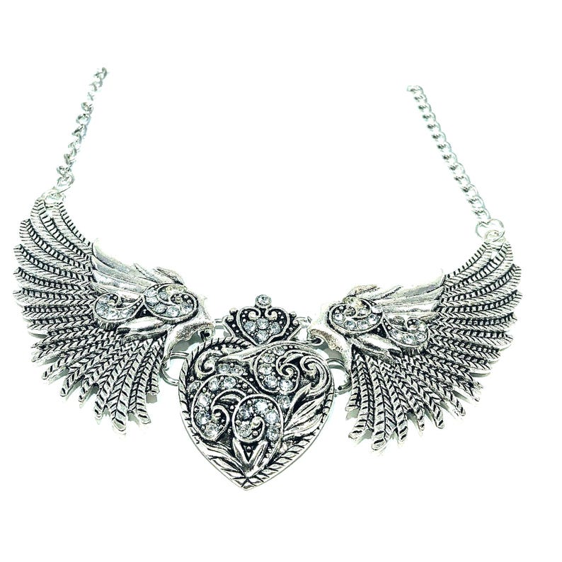 large winged heart necklace, silver color.
