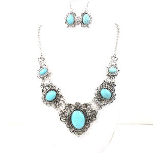 filigree turquoise necklace and earring set, antique silver color, for women. (photo of necklace set taken on a white mannequin with white background)