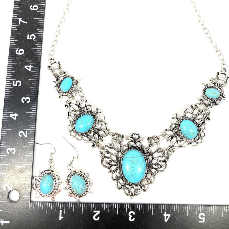 showing approximate measurement of filigree turquoise necklace and earring set, antique silver color, for women.