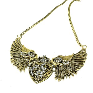 large wings with heart statement necklace, antique gold color