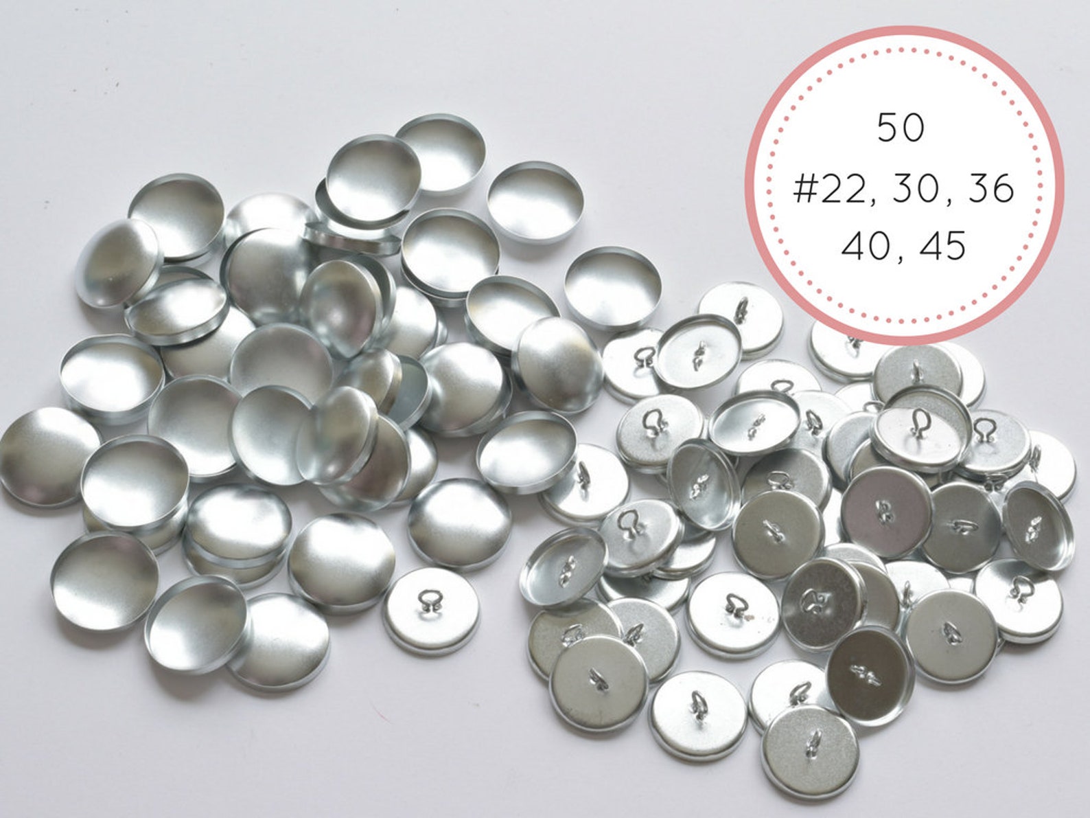 22 buttons. Buttons made of base metals.