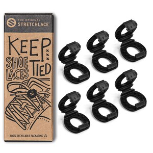 May include: Six black plastic shoelace clips with the text "Keep Shoe Laces Tied" on a brown box with the text "The Original Stretchlace" on the top.