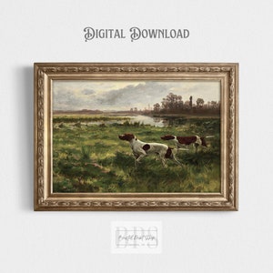 May include: A vintage painting depicting three hunting dogs in a field. The dogs are white with brown markings and are running through long grass. The painting is framed in a gold frame.