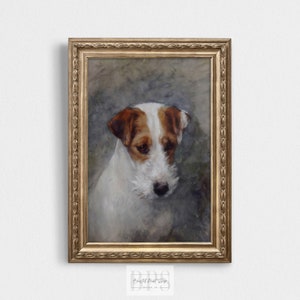 May include: A framed painting of a white and brown dog with a sad expression. The dog is looking down and has a brown nose and brown ears. The painting is in a gold frame.