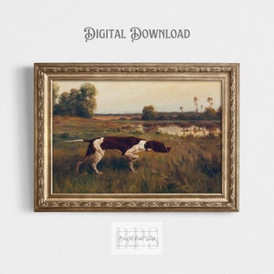 May include: A framed vintage-style print featuring a brown and white dog in a field, with a body of water in the background. The artwork is set in a gold-colored ornate frame. The words "DIGITAL DOWNLOAD" are at the top.