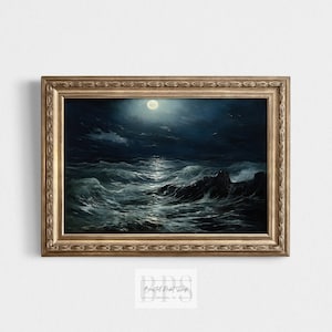 May include: A framed painting of a stormy sea at night with a full moon shining brightly in the sky. The waves are crashing against the rocks in the foreground. The painting is in a gold frame.