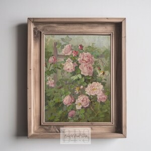 Puede incluir: Una pintura vintage de un rosal rosa creciendo en un enrejado. Las rosas est&aacute;n en plena floraci&oacute;n y las hojas son de un verde vibrante. La pintura est&aacute; enmarcada en un marco de madera r&uacute;stico.