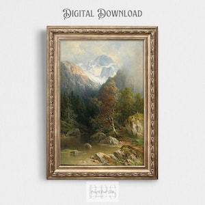 May include: A framed painting depicting a mountainous landscape with a lake in the foreground. The mountains are snow-capped and the lake is surrounded by trees. The painting is in a gold frame.