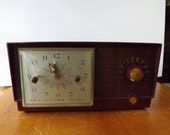 RCA Victor Deluxe clock radio, vintage electronic, retro, maroon, mid century, decor, decoration, bedroom, display, stereo, dial, alarm, old