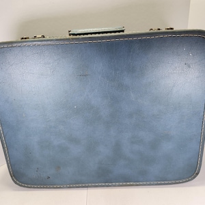 Vintage Towncraft Blue Suitcase: Retro Travel Luggage with Key