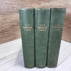 May include: Three green hardcover books with gold lettering. The books are part of the I.C.S. Reference Library.