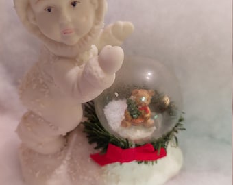 Vintage Porcelain Snow Baby Figurine with Christmas Snow Globe
