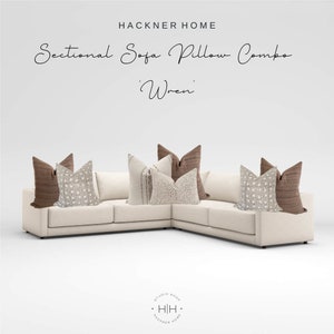 May include: A sectional sofa with white fabric upholstery and a set of brown and beige patterned throw pillows. The sofa is arranged in an L-shape with the pillows placed on the back and seat cushions. The text "Sectional Sofa Pillow Combo 'Wren'" is displayed above the sofa.