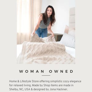 May include: A beige cable knit throw blanket with a textured pattern. The text HACKNER HOME Studio Shop is at the top. The text WOMAN OWNED is below the image. Additional text includes Home & Lifestyle Store, Follow & be inspired, and HACKNERHOME.COM.