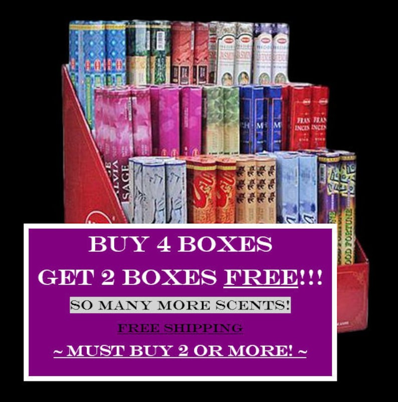 May include: A selection of incense sticks in a tiered display, featuring a range of colours and brands. The display is held in a red cardboard holder. A purple banner displays text, including "BUY 4 BOXES GET 2 BOXES FREE!!!" and "SO MANY MORE SCENTS!"