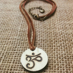 Hand burned wooden coin lotus Om necklace, pyrography, burned, deerskin lace, henna design, namaste, yoga, meditation, heart, love
