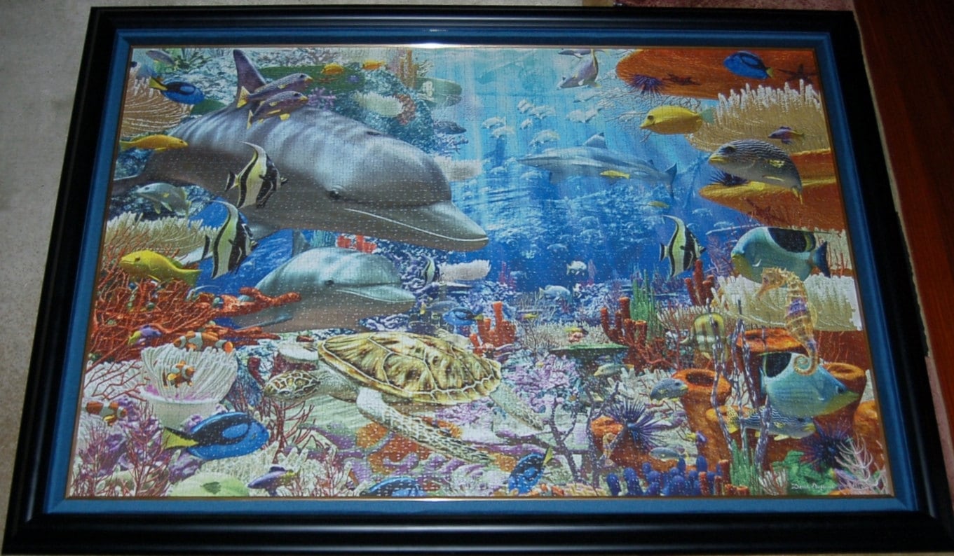 Professionally framed wall art, home decor, and office decor.  3000 piece completed Ocean Ravensburger puzzle framed by Pictures Plus.