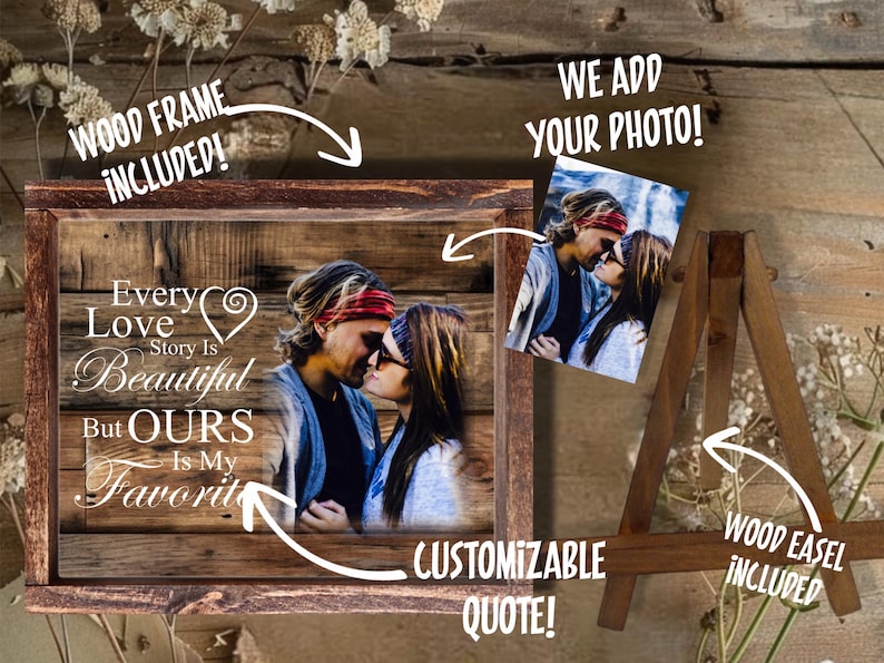 May include: A rectangular wooden frame containing a printed photograph of a couple facing each other, overlaid with the white text: Every Love Story Is Beautiful But OURS Is My Favorite. The set includes a wooden easel for display purposes.