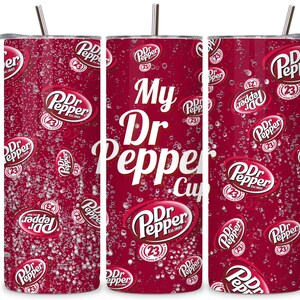 May include: Three stainless steel tumblers with a red and white Dr Pepper design. The tumblers have a straw and the middle tumbler says "My Dr Pepper Cup".