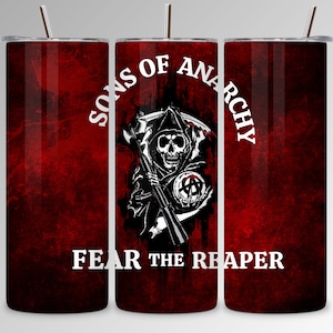 May include: A red stainless steel tumbler with a Sons of Anarchy logo and the text "Fear the Reaper". The logo features a skull with a scythe and an anarchy symbol.