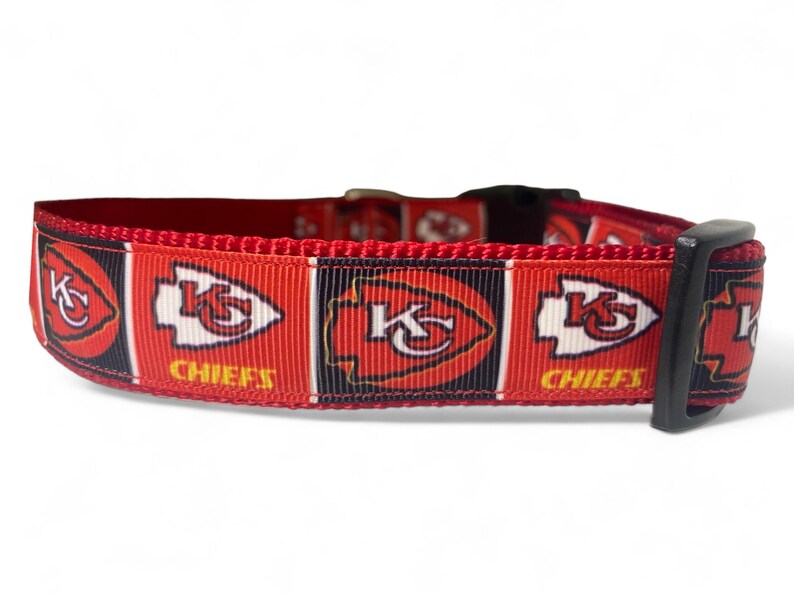 May include: Red, black, and white dog collar with the Kansas City Chiefs logo and "Chiefs" text.