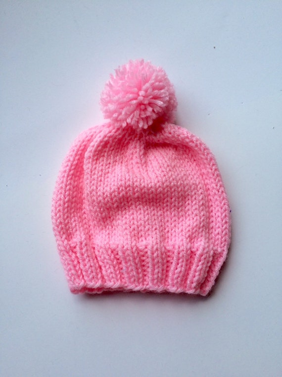 pink knitted baby hat