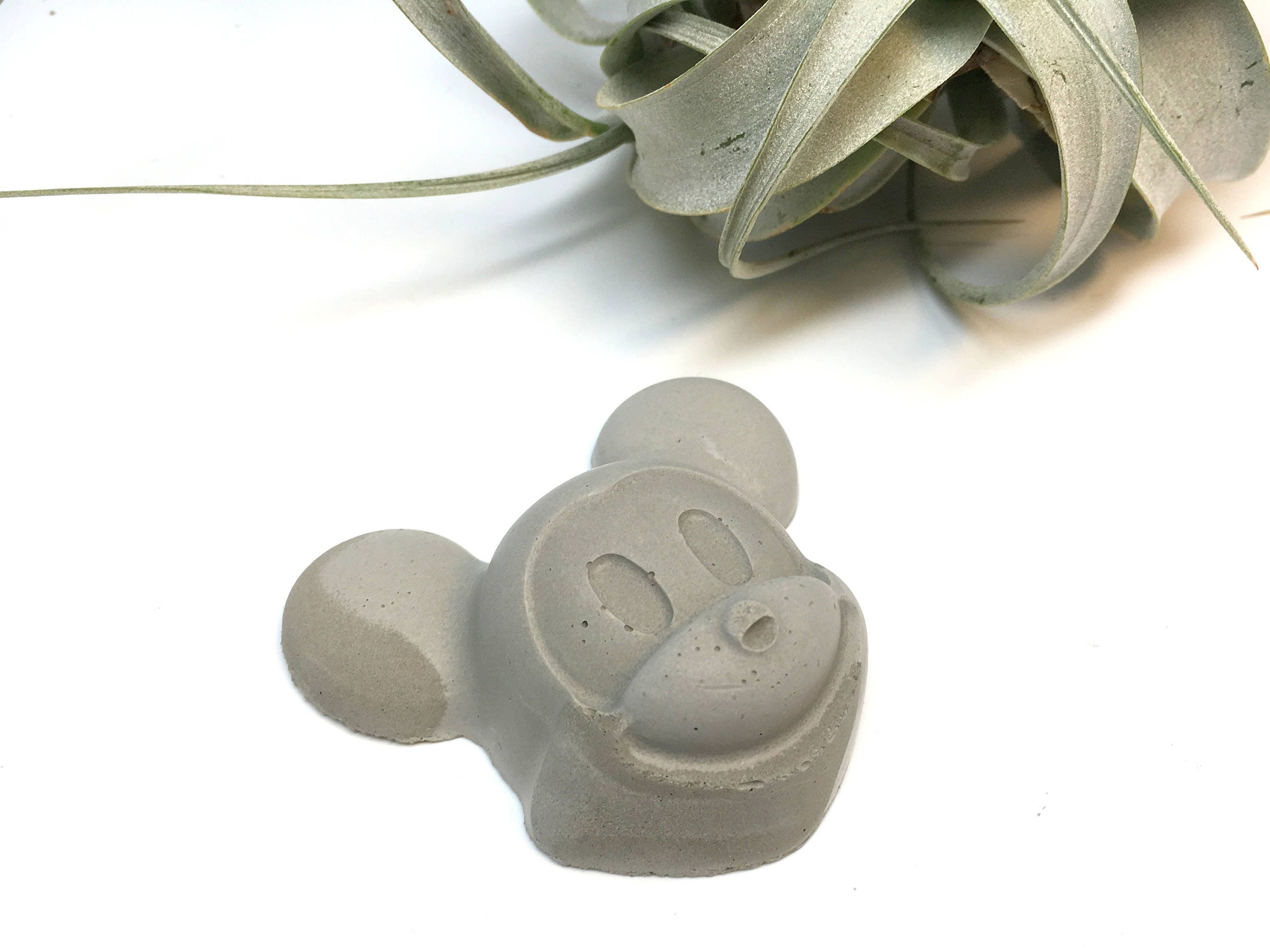 cement mickey mouse statue